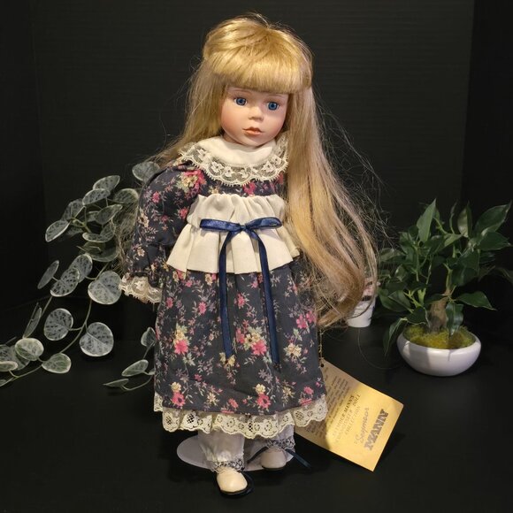 Vintage Porcelain Doll with Blue Floral Dress - Picture 1 of 3